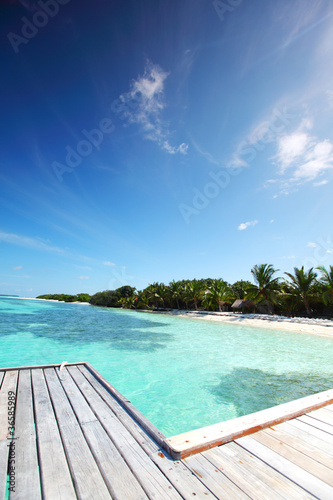 Fototapeta Naklejka Na Ścianę i Meble -  resort maldivian houses in blue sea