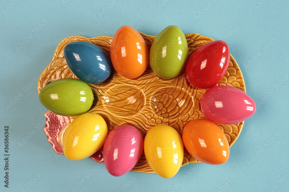 Fototapeta premium Colorful Easter eggs on a blue background