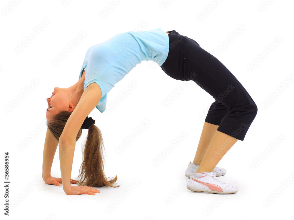 Naklejka premium The beautiful young woman plays sports on a white