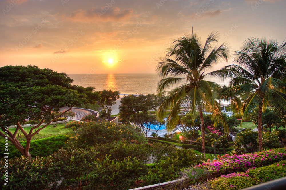 Fototapeta Sunset at tropical resort