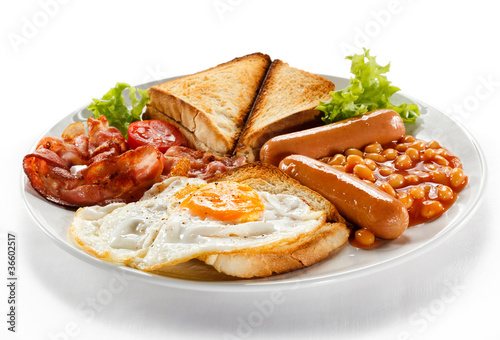 English breakfast - toast, egg, bacon and vegetables