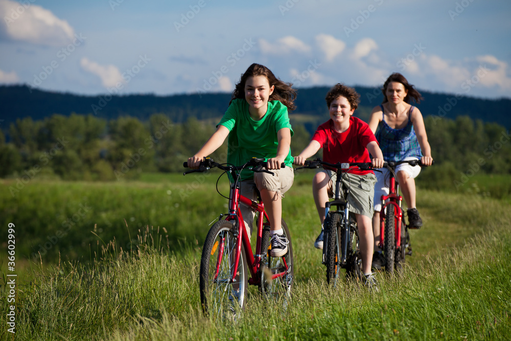 Family riding bikes