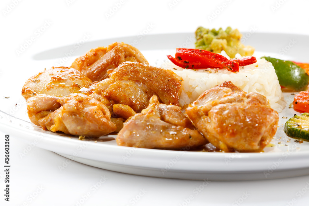 Fried chicken nuggets, white rice and vegetables Fried chicken nuggets, white rice and vegetables
