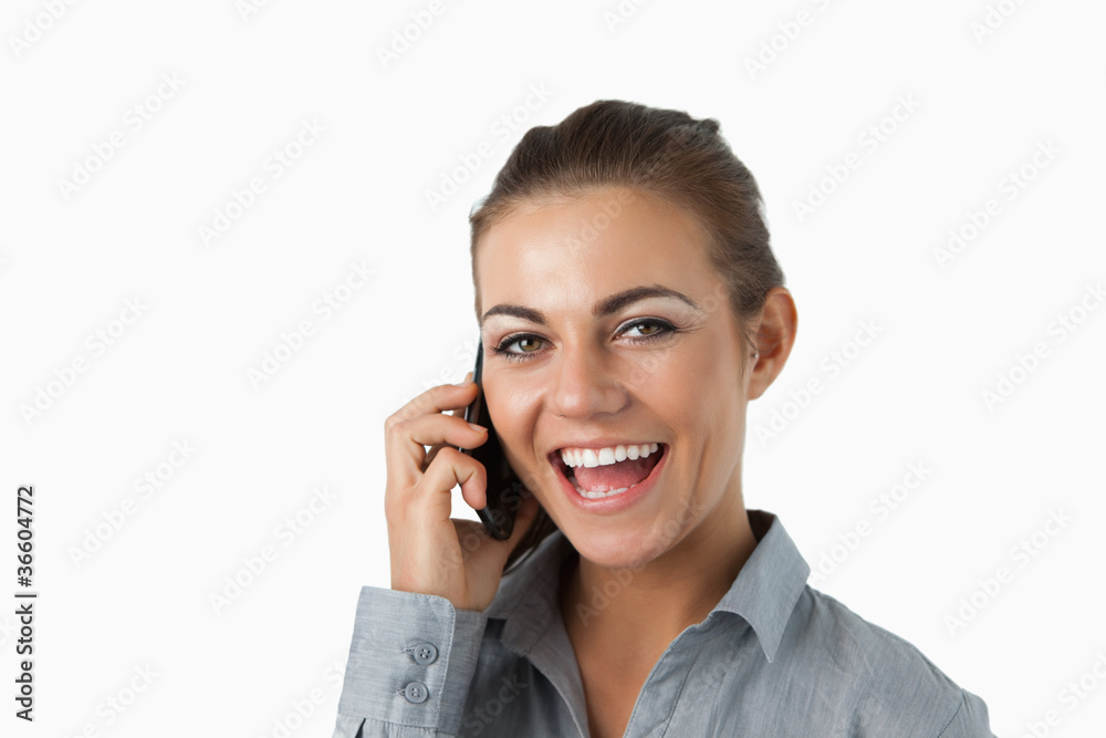 Close up of laughing businesswoman on the phone Close up of laughing businesswoman on the phone