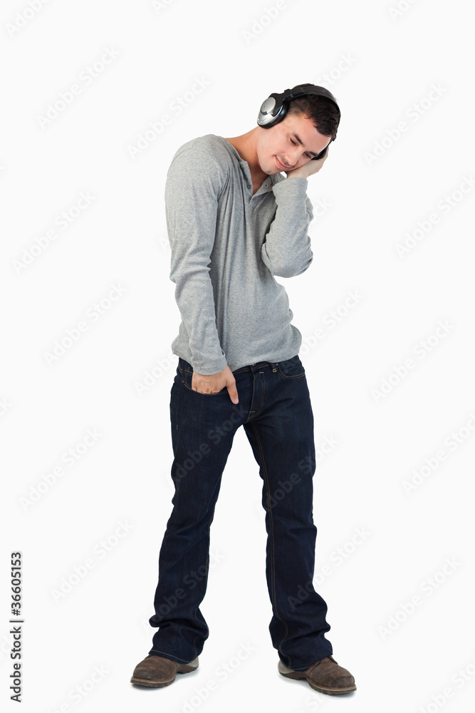 Young male enjoying music Young male enjoying music