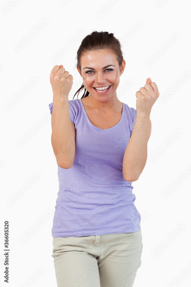Young female celebrating victory Young female celebrating victory