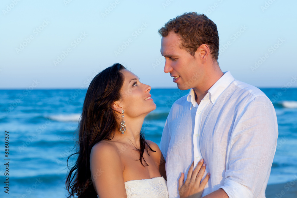 couple in love hug in blue sea vacation couple in love hug in blue sea vacation