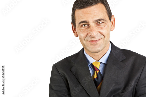 Portrait of confident businessman over white background