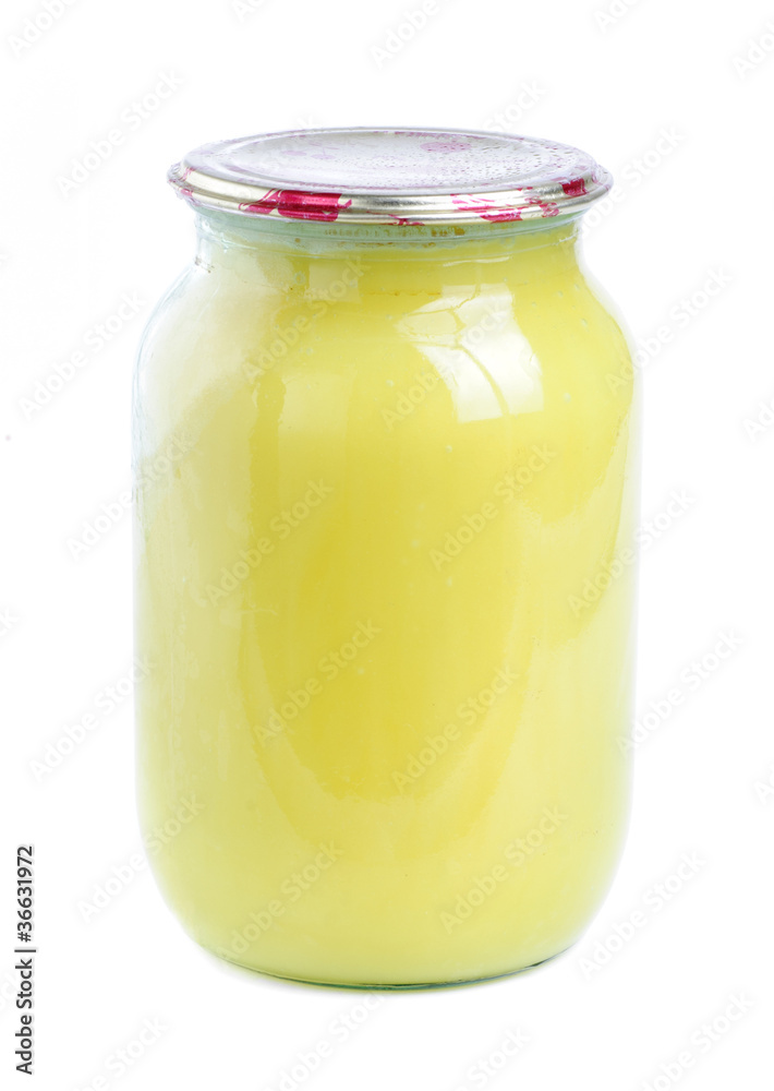 honey in glass jar isolated honey in glass jar isolated