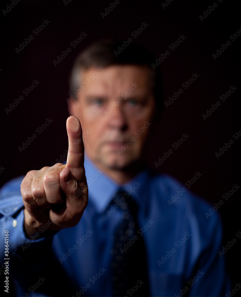 Male executive touches sensor Male executive touches sensor