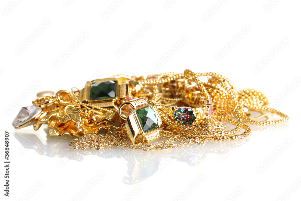Various gold jewellery isolated on white Various gold jewellery isolated on white