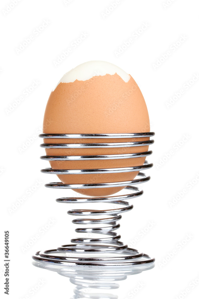 boiled egg in metal stand isolated on white boiled egg in metal stand isolated on white