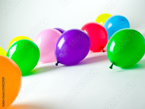 colorful ballons over a white background