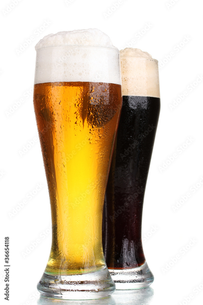 black and golden beer in glasses isolated on white