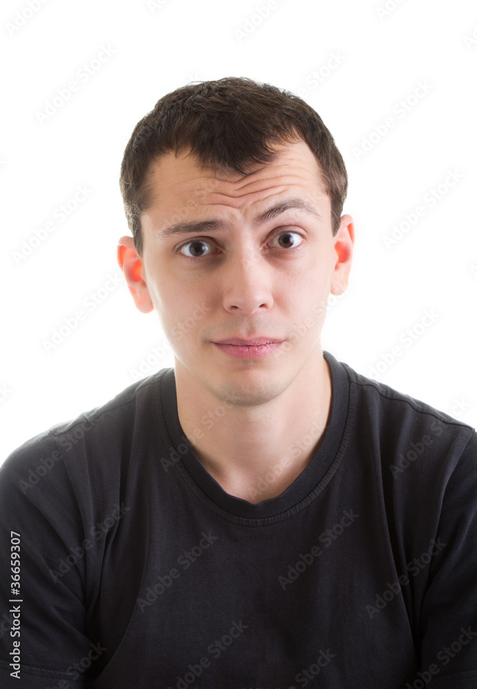 Obraz premium Puzzled young man