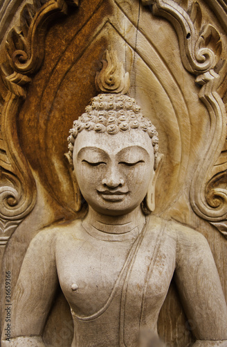The wooden Buddha.