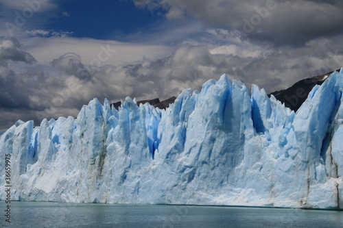 Perito Moreno glacier with mountains and amazing colours © guppyimages