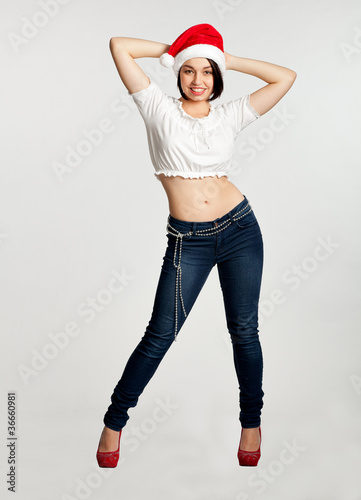 Portrait of beautiful sexy girl wearing Santa clothes