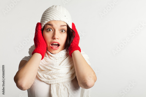 Amazed christmas girl. Isolated on white background.