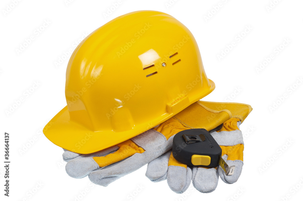 Tools and helmet of the builder, it is isolated on white