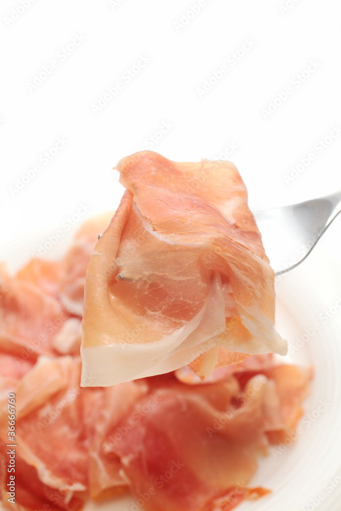 Uncured ham on fork