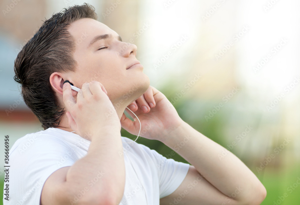 Young attractive man with headphones Young attractive man with headphones