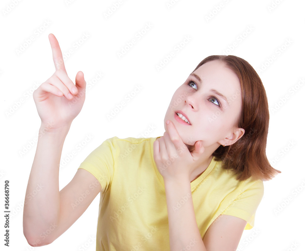 Fototapeta premium Young woman pointing to the top side