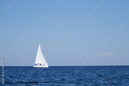 Sailboat sailing with blue sky