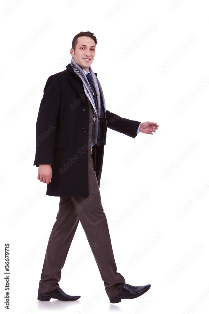 side view of a walking business man side view of a walking business man
