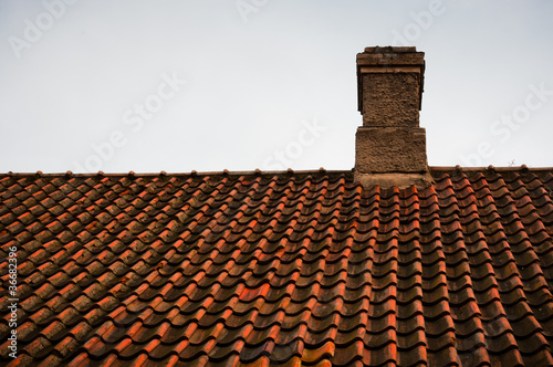 Roof tiles texture with chimney © dmitryelagin