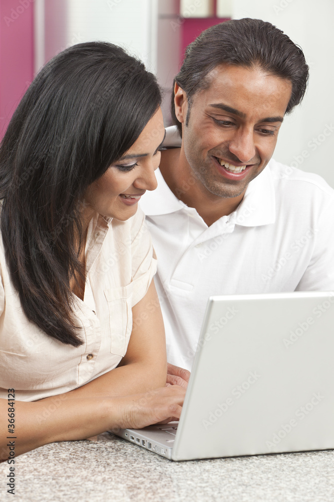 Asian Indian Man & Woman Couple Using Laptop Computer