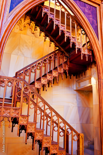 Wooden staircase inside of catholic church