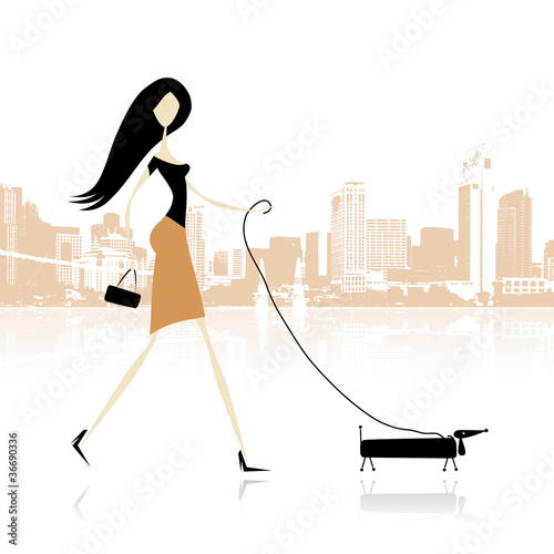 Girl with dog walking in the city