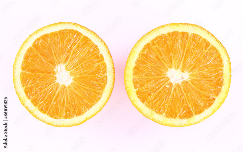 Orange cut in half on a white background