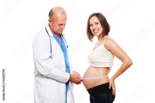 doctor measuring stomach