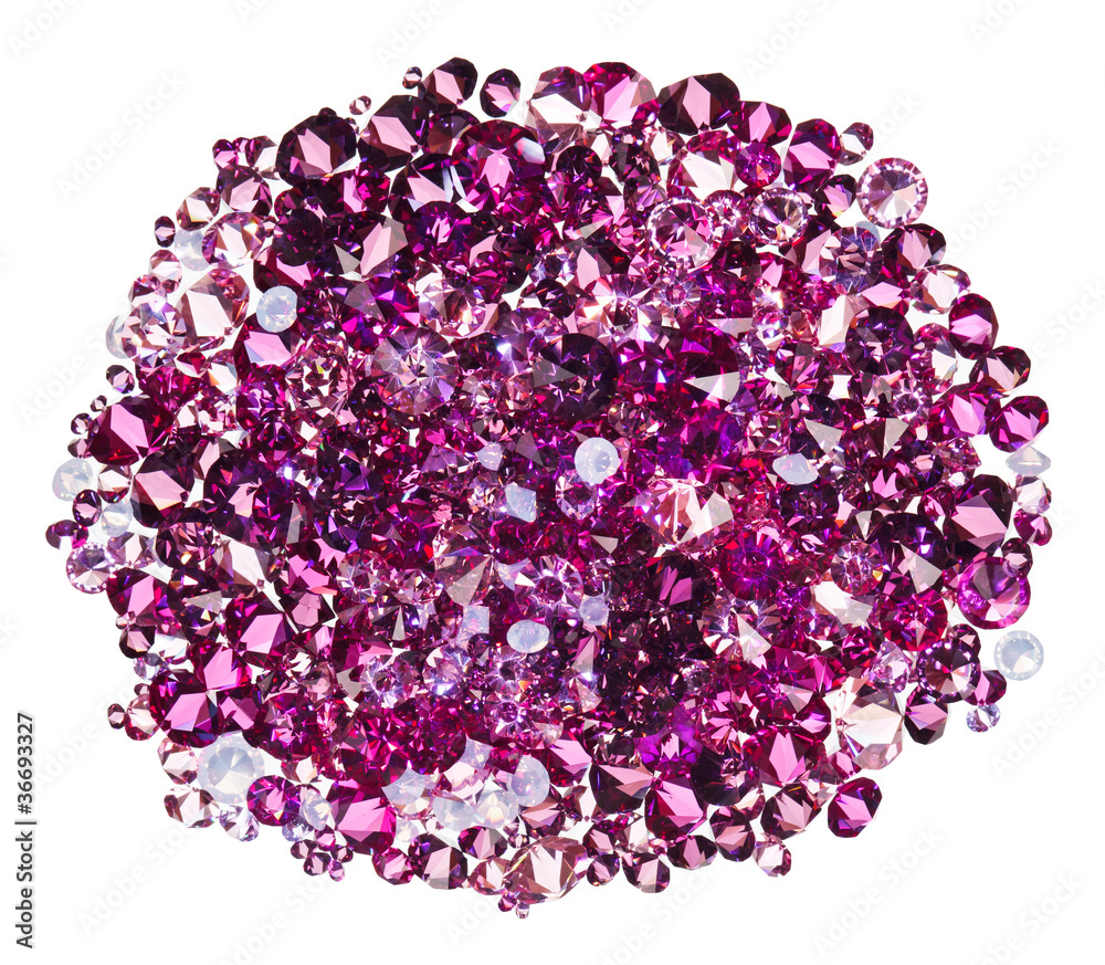 Many small ruby diamond (jewel) stones heap isolated on white Many small ruby diamond (jewel) stones heap isolated on white