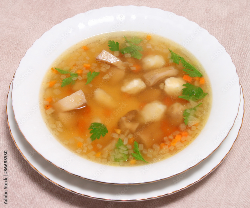 Hot mashroom soup on a served table