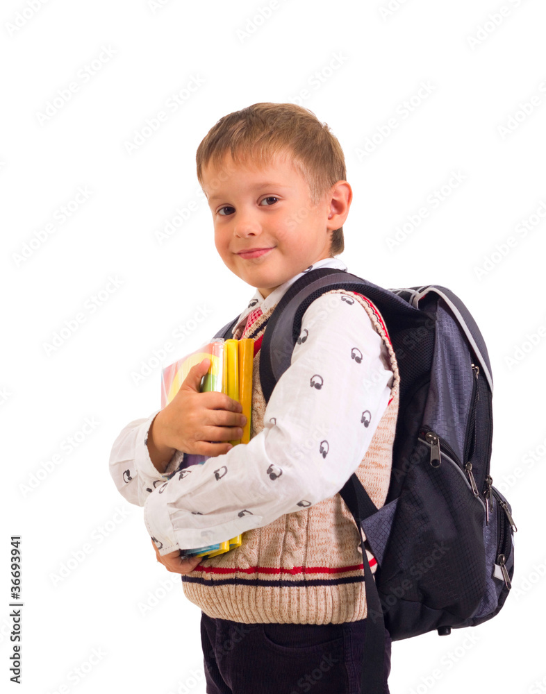 portrait of male elementary pupil on white