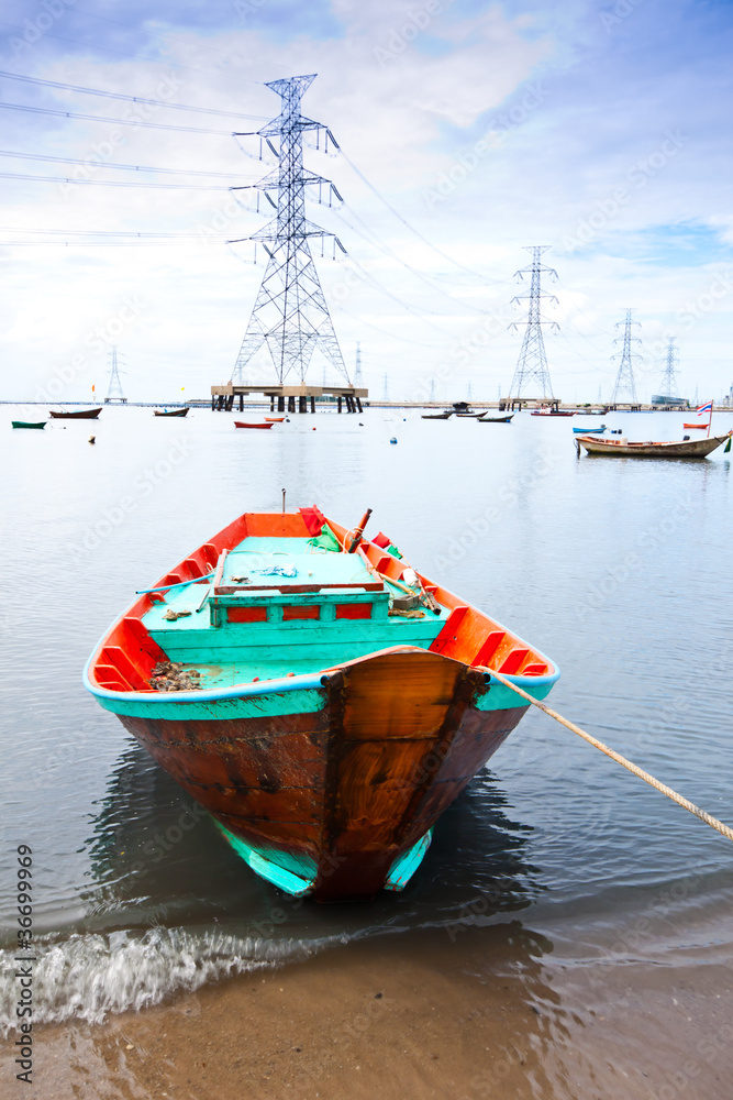 fishing boat with power plant background