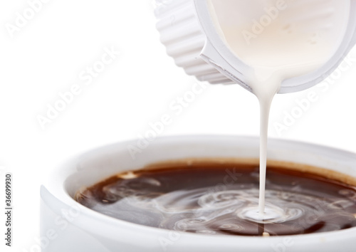 cream poured in coffee