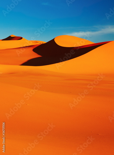 Sand dune in Sahara Desert at sunset, Tadrart, Algeria