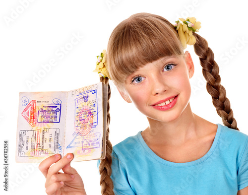 Child holding passport.