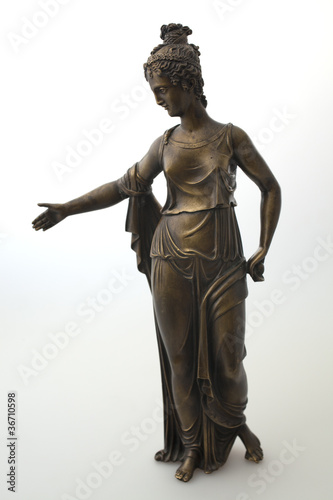 Classical Roman statue of a woman front on white background