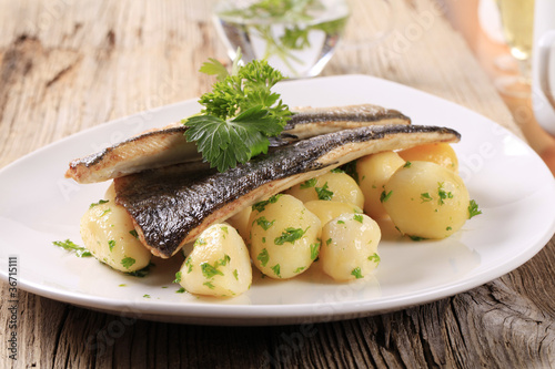 Pan fried trout fillets with potatoes