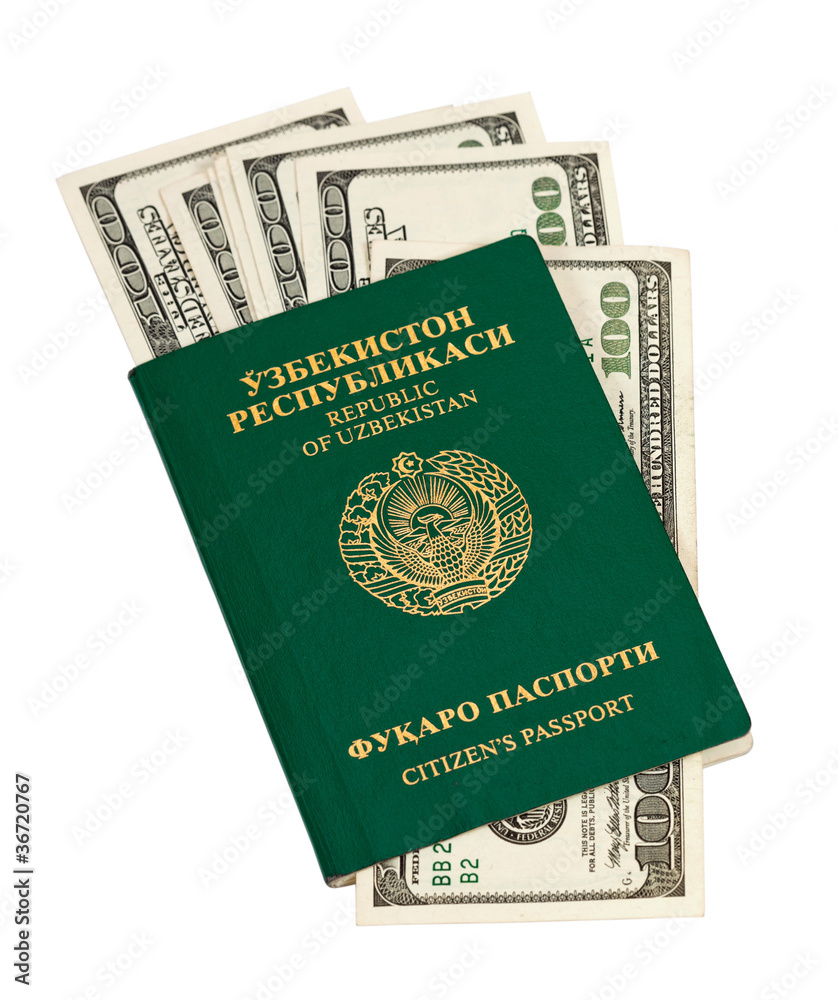 Uzbekistan passport and money isolated on white background Uzbekistan passport and money isolated on white background