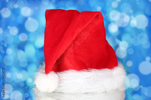 Beautiful Christmas hat on a blue background