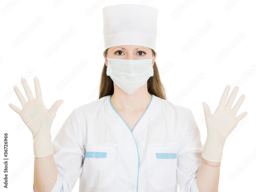 Woman doctor wearing a mask and gloves, hat Woman doctor wearing a mask and gloves, hat