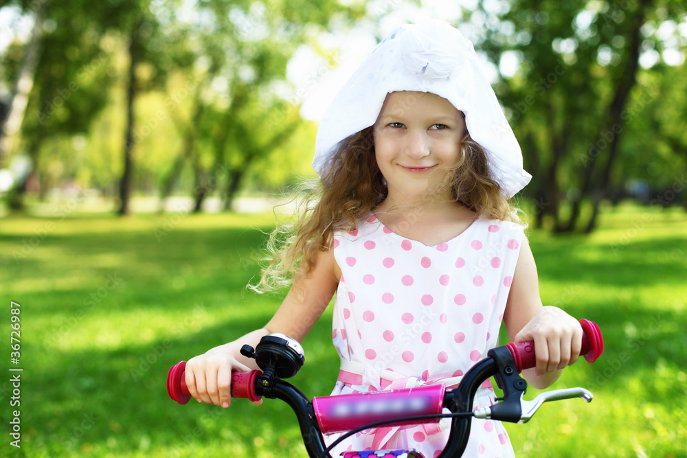 Little girl in summer park Little girl in summer park