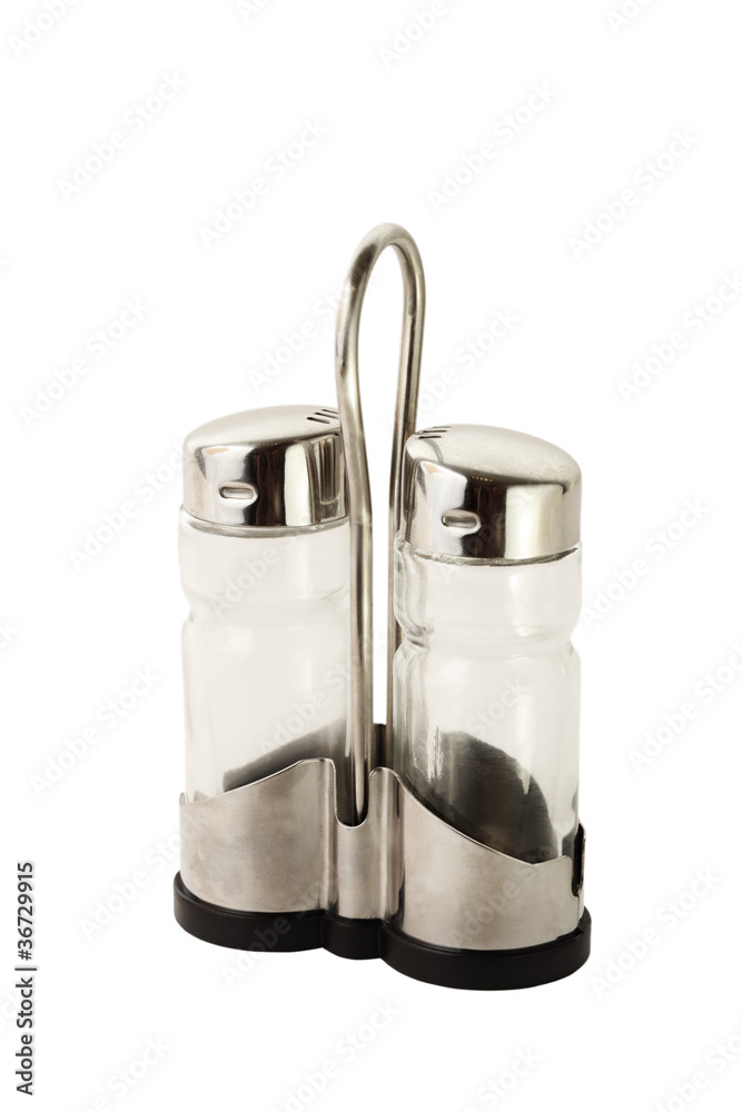 empty salt shaker and pepper shaker on metal stand isolated empty salt shaker and pepper shaker on metal stand isolated