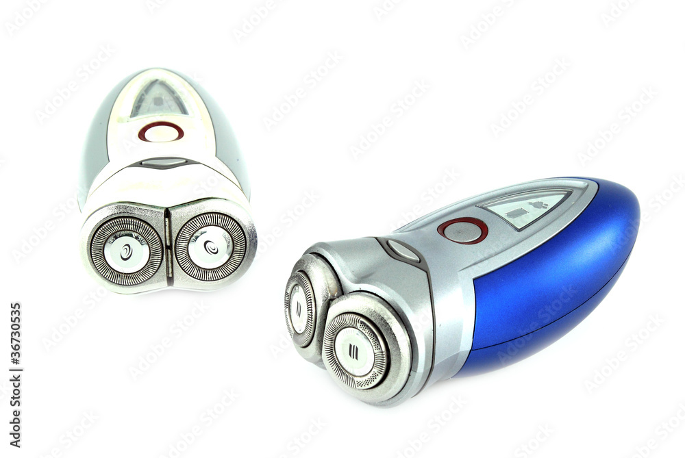two electric shaver isolated with white background